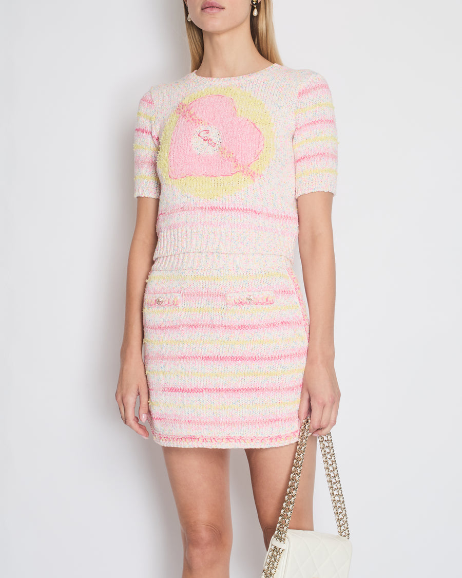 *RUNWAY* Chanel 24C Resort Pink 
Yellow Multi-colour Jumper and Skirt Set with Cupid Heart "Coco" Detail Top Size FR 34 (UK 6) Skirt Size FR 36 (UK 8)