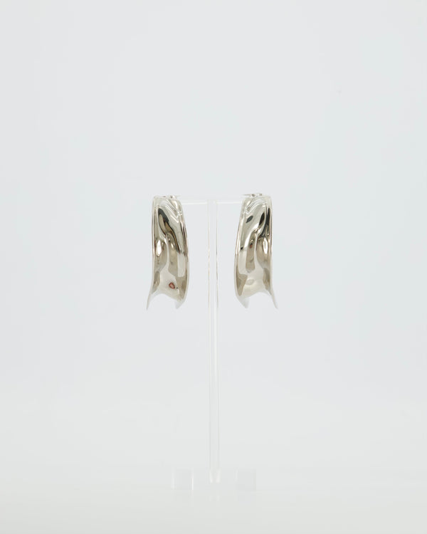 Alaïa Fluide Drop Hoop Earrings in Silver