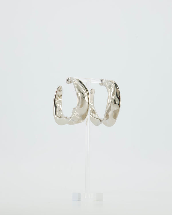 Alaïa Fluide Drop Hoop Earrings in Silver