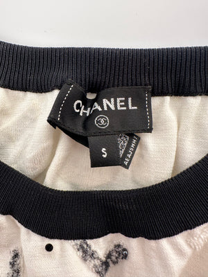 Chanel 22S White 
Black Logo 
Camellia Print Crop Top 
Shorts Set with Black Trim 
Metallic Applique Details Size S (UK 8)
