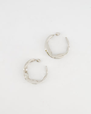 Alaïa Fluide Drop Hoop Earrings in Silver