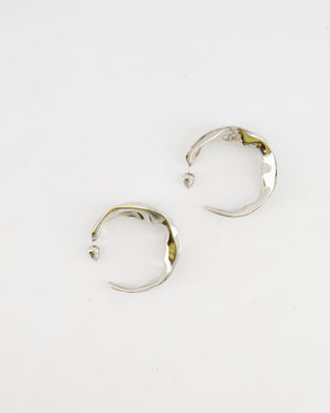 Alaïa Fluide Drop Hoop Earrings in Silver