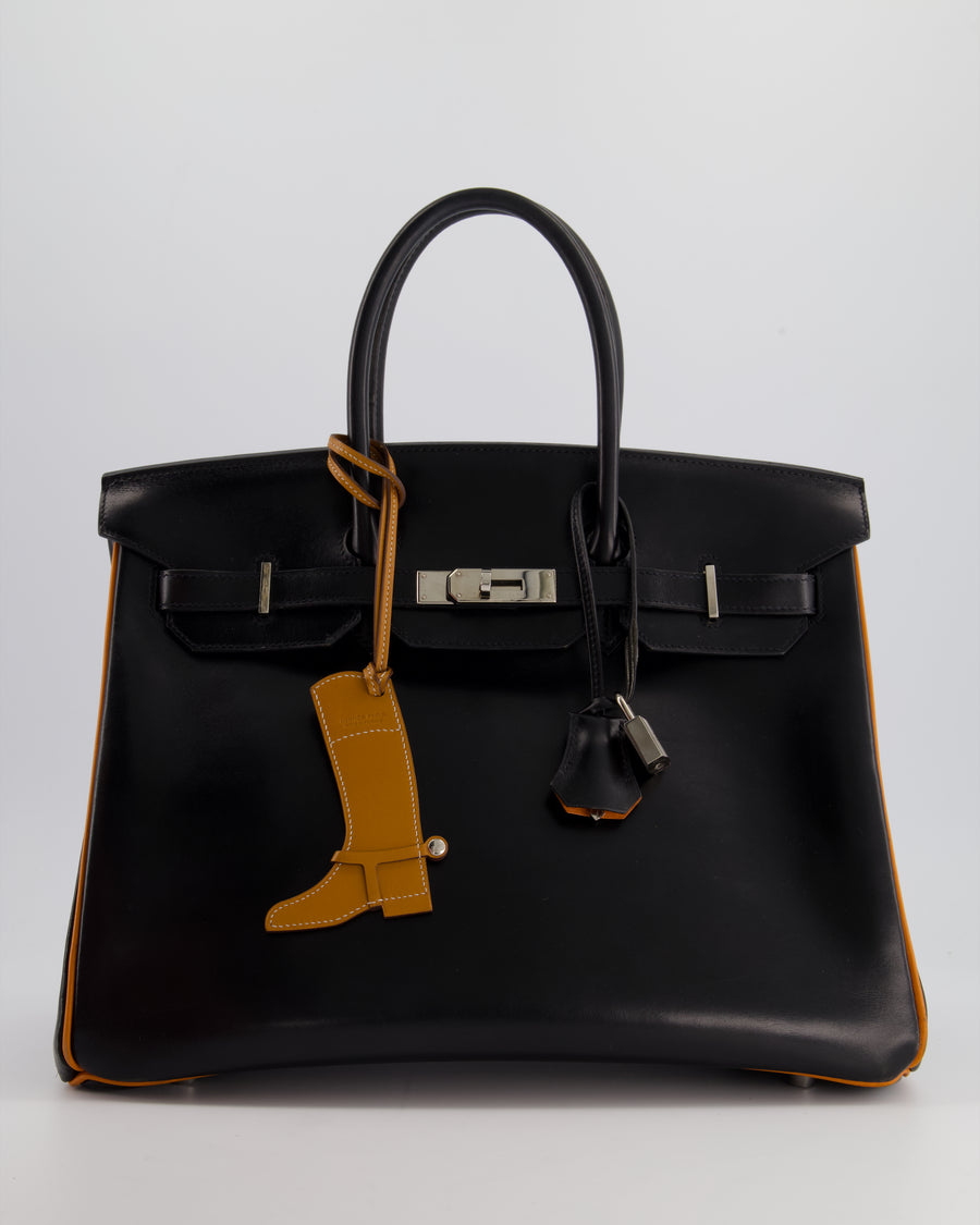 *SUPER RARE* Special edition Hermès Birkin HSS Bag 35cm in Black Box Leather, Orange Edges 
Interior with Palladium Hardware