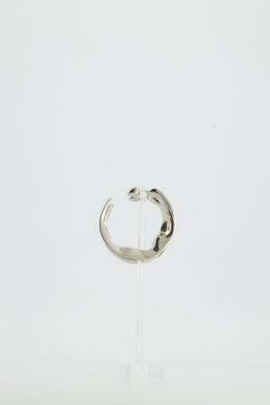 Alaïa Fluide Drop Hoop Earrings in Silver