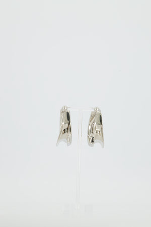 Alaïa Fluide Drop Hoop Earrings in Silver