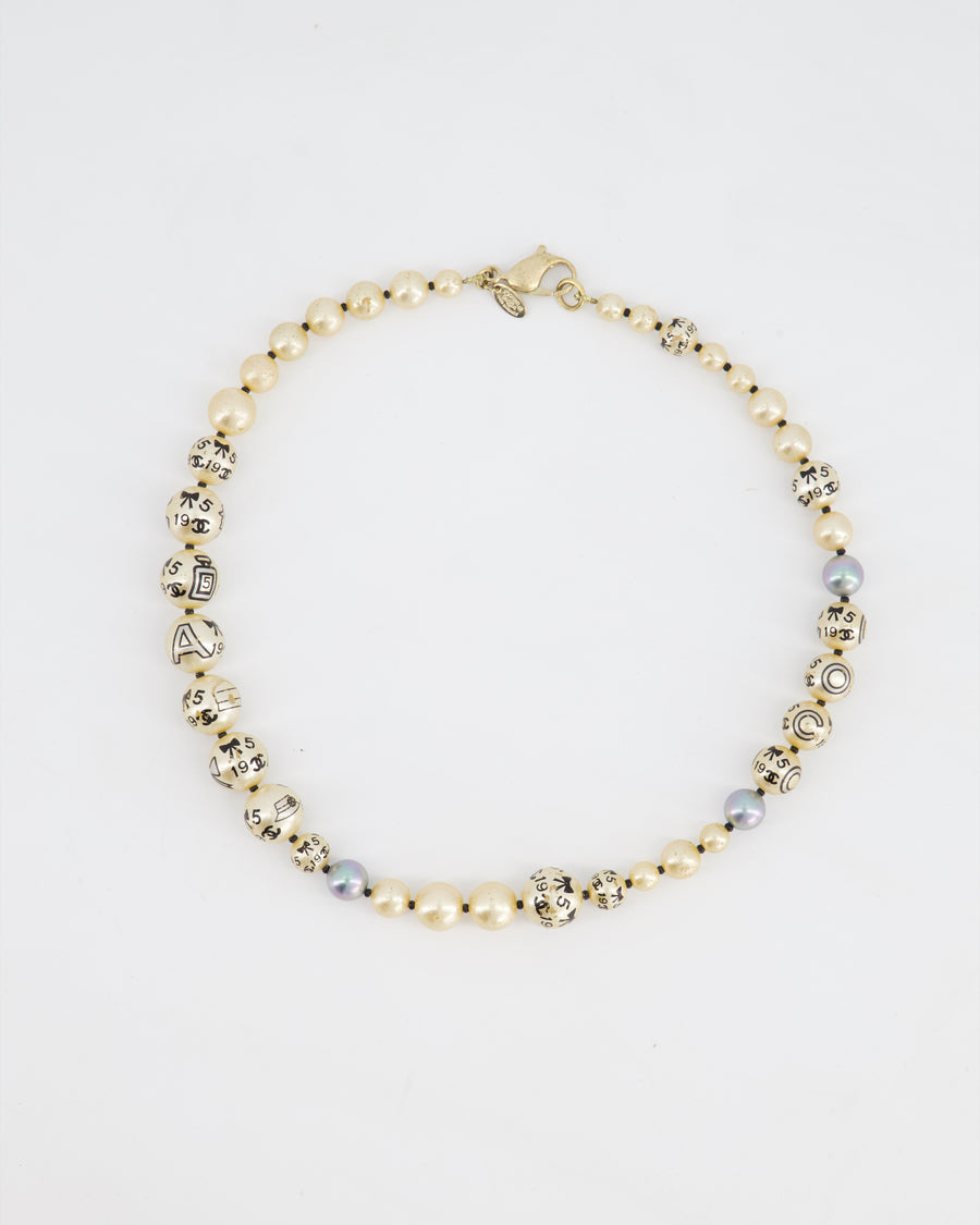 Chanel Vintage Pearl 2005A Necklace with Charm Print