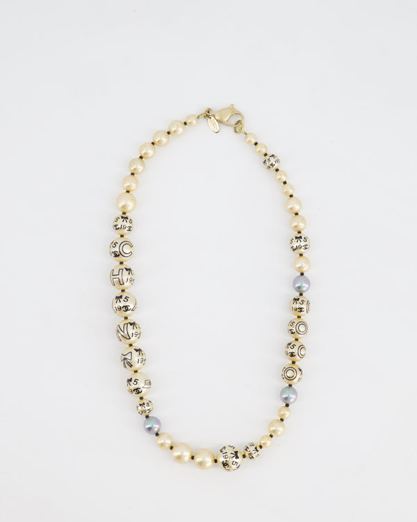 Chanel Vintage Pearl 2005A Necklace with Charm Print