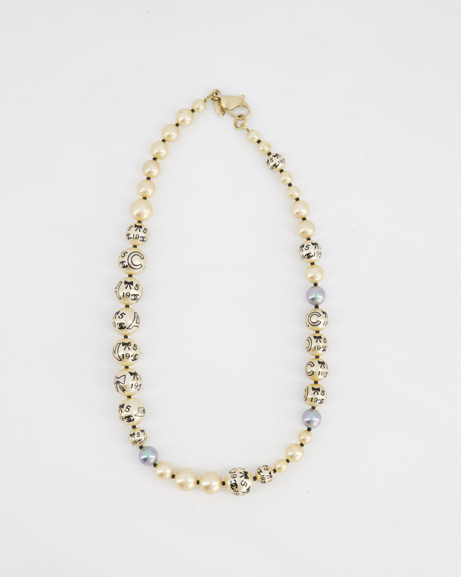 Chanel Vintage Pearl 2005A Necklace with Charm Print