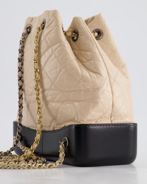 Chanel Nude, Black Mini Gabrielle Backpack in Aged Calfskin Leather with Ruthenium 
Brushed Gold Hardware