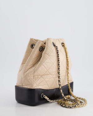 Chanel Nude, Black Mini Gabrielle Backpack in Aged Calfskin Leather with Ruthenium 
Brushed Gold Hardware