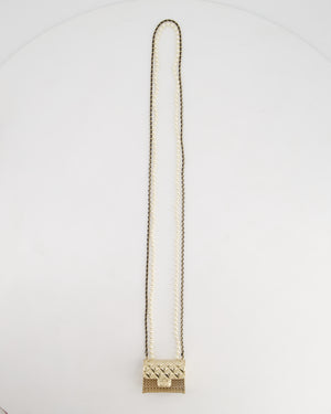 *RARE* Chanel 21S Champagne Gold Bag Charm Necklace with White Pearls 
Black Leather Chain Detail