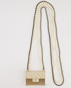 *RARE* Chanel 21S Champagne Gold Bag Charm Necklace with White Pearls 
Black Leather Chain Detail