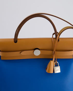 *HOT 
RARE* Hermès Herbag 31 in Bleu Zanzibar Berlin Coated Canvas, Natural Vache Hunter Leather and Ecrù Toile H Canvas with Palladium Hardware