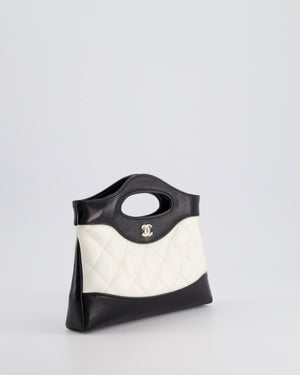 Chanel Mini 31 Clutch Bag with Chain in Black and White Shiny Calfskin Leather with Champagne Gold Hardware