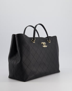 Chanel Black Quilted Tote Bag in Calfskin Leather with Champagne Hardware 
CC Detail