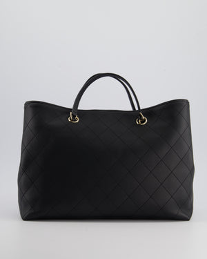 Chanel Black Quilted Tote Bag in Calfskin Leather with Champagne Hardware 
CC Detail