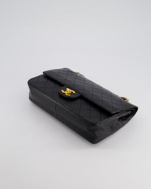 Chanel Vintage Black Medium Double Flap Bag in Lambskin Leather with 24K Gold Hardware 
Reissue Chain Detail